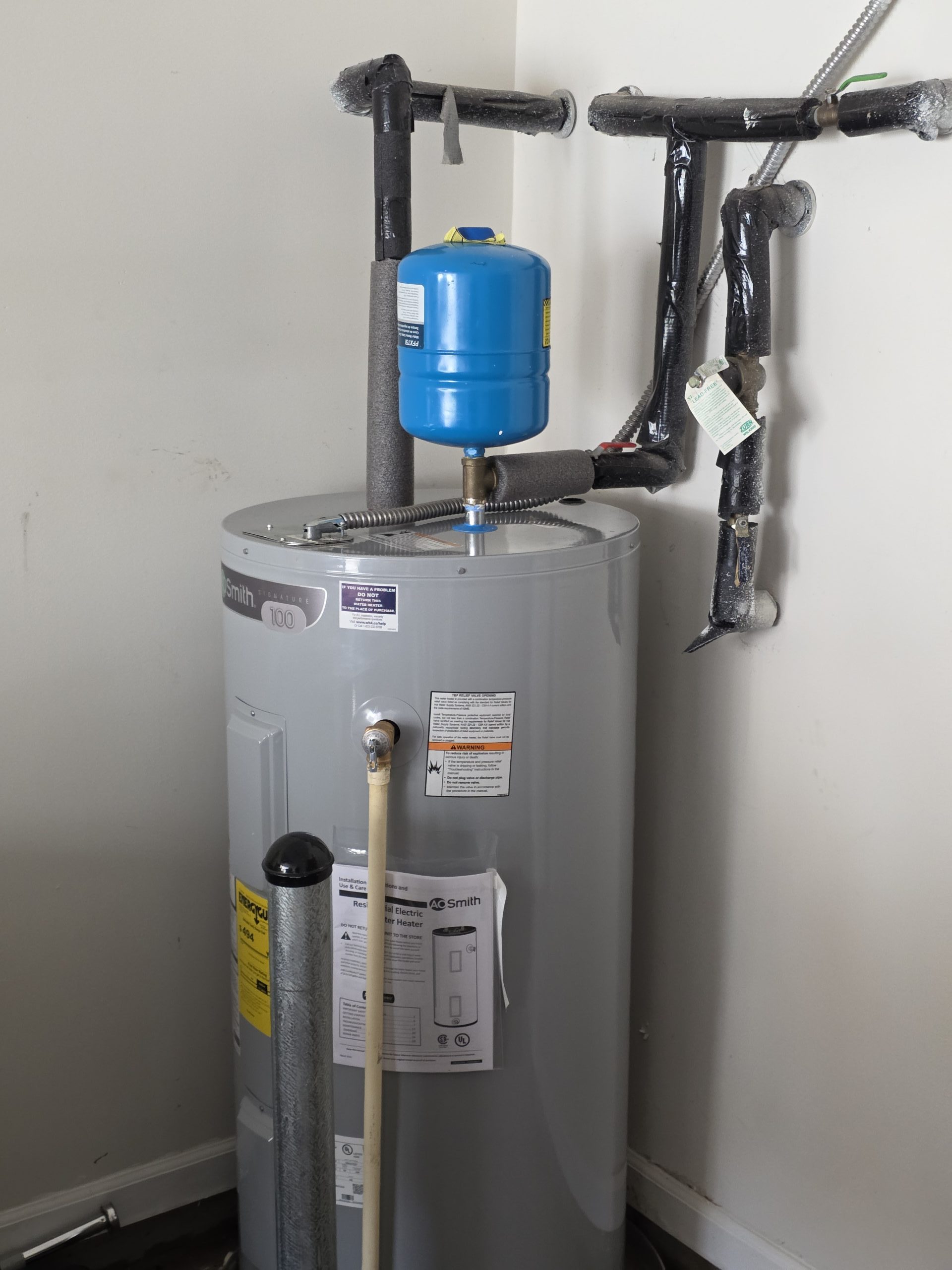 traditional water heater vs tankless comparison cost